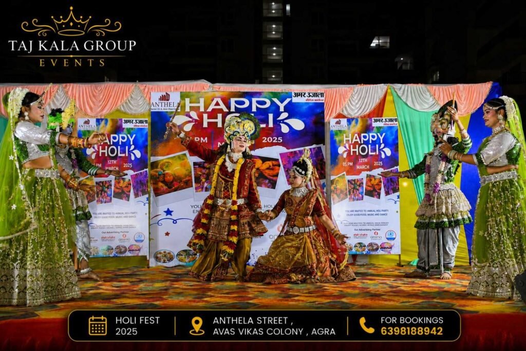Taj Kala Group performs a live Radha Krishna Mayur Nritya folk dance during the Anthela Street Holi Fest in Agra.